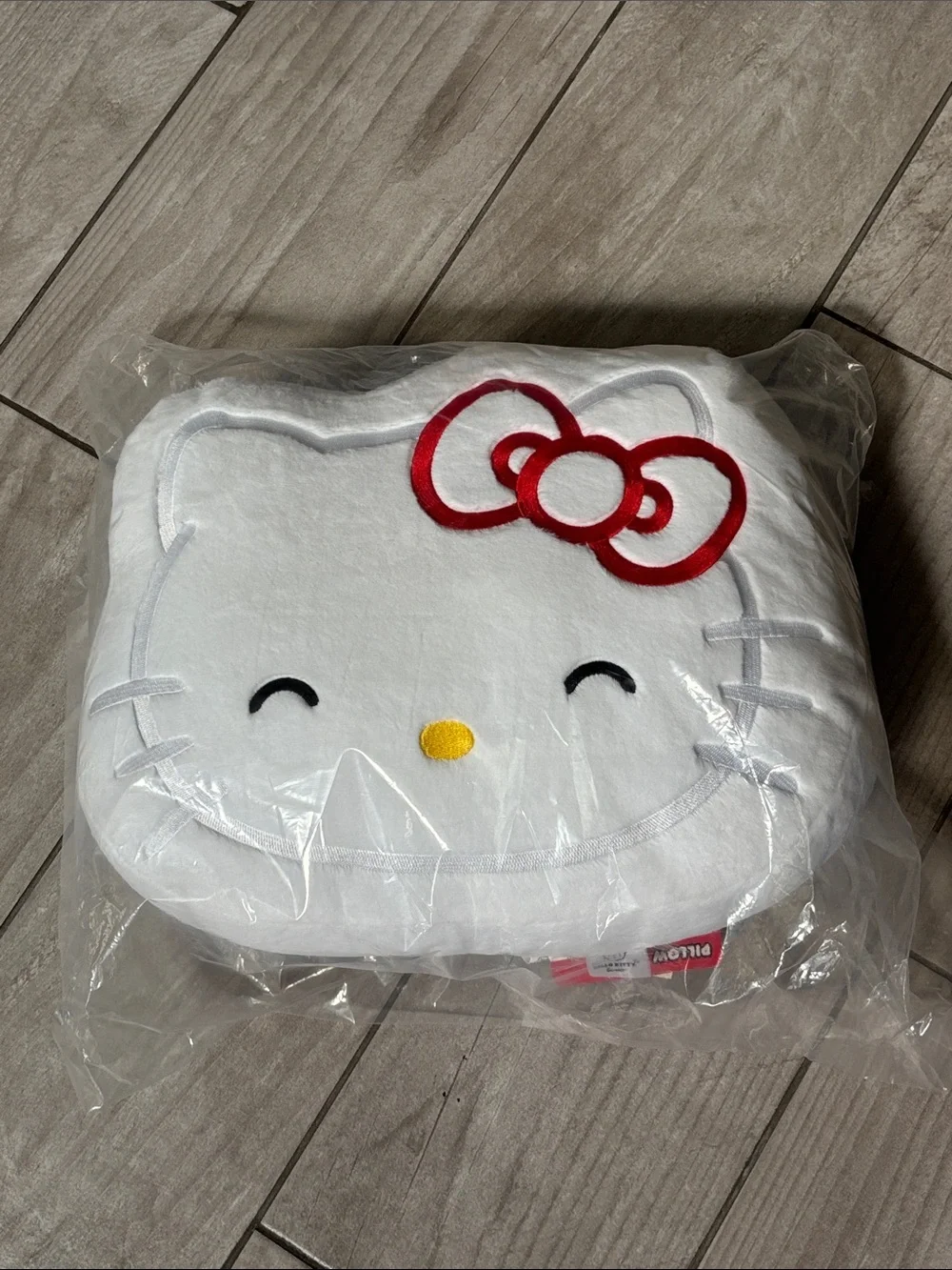Sanrio Hello Kitty White Plush Face Pillow with Red Bow and Yellow Nose
